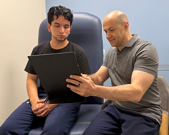 Testosterone clinic NYC patient consultation with a doctor for TRT evaluation